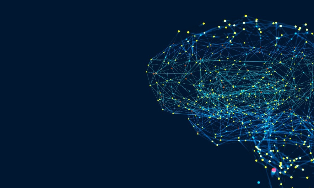 Glowing blue network of connected nodes and lines forming the shape of a human brain on a navy field